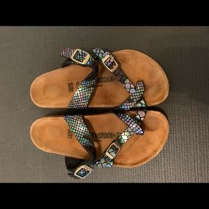 black and purple patterned Birkenstock’s